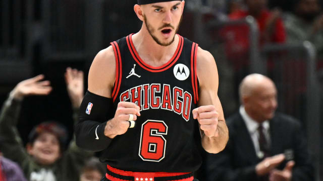 Chicago Bulls guard Alex Caruso (6) celebrates